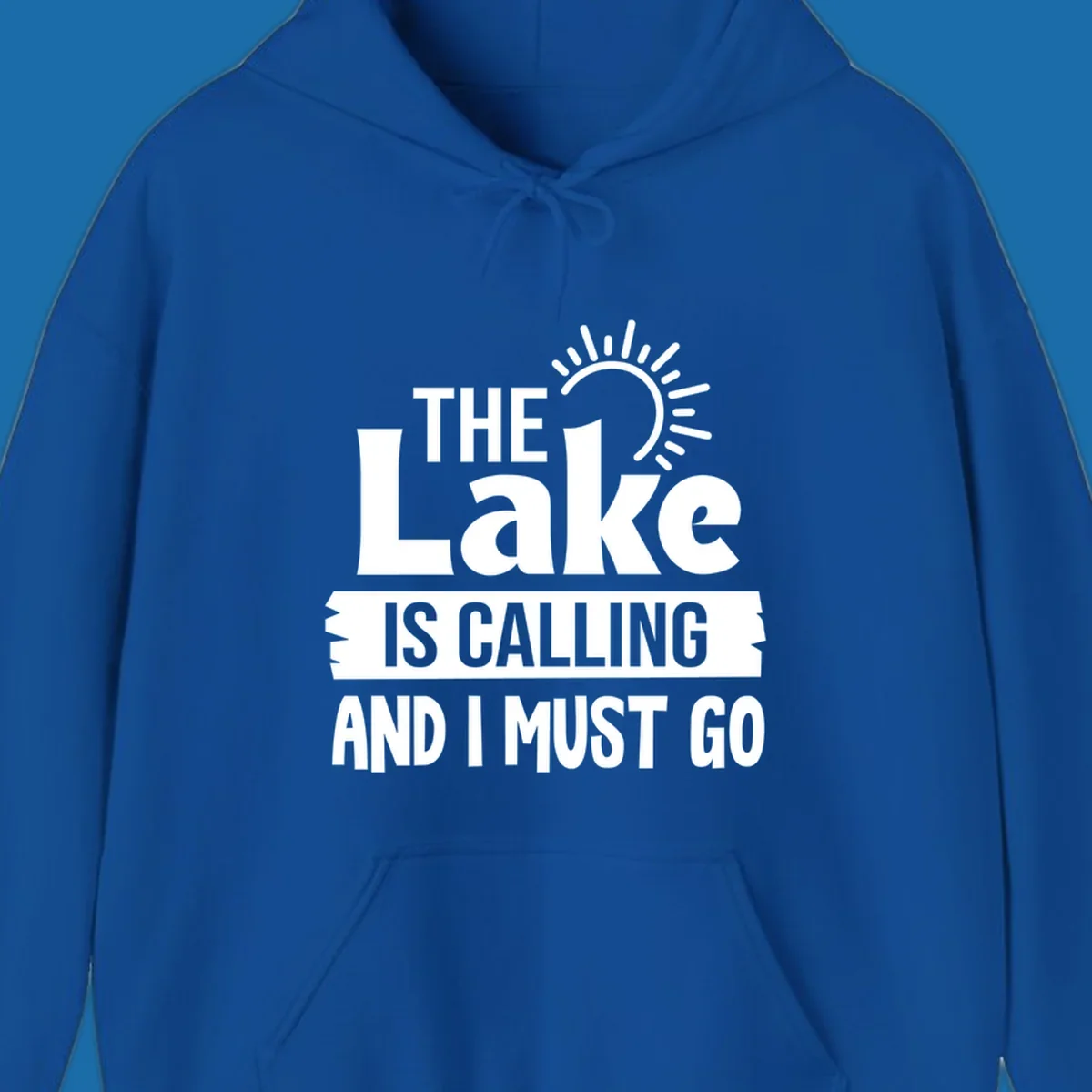 The Lake Is Calling And I Must Go text with a sun graphic. lake-calling-go
