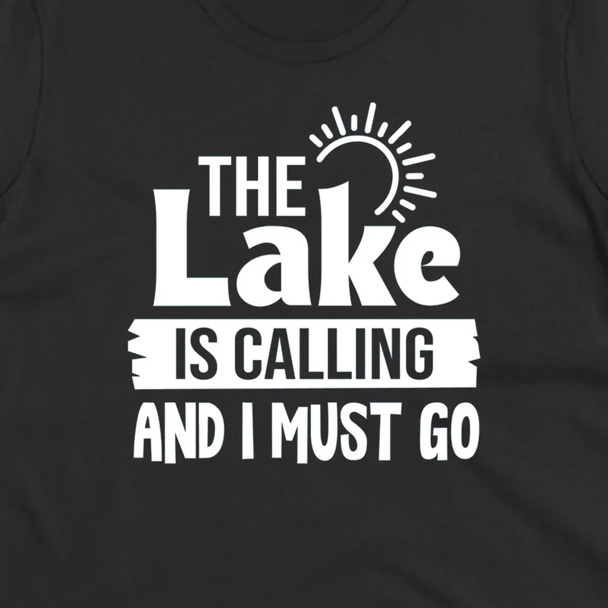 The Lake Is Calling And I Must Go text with a sun graphic. lake-calling-go