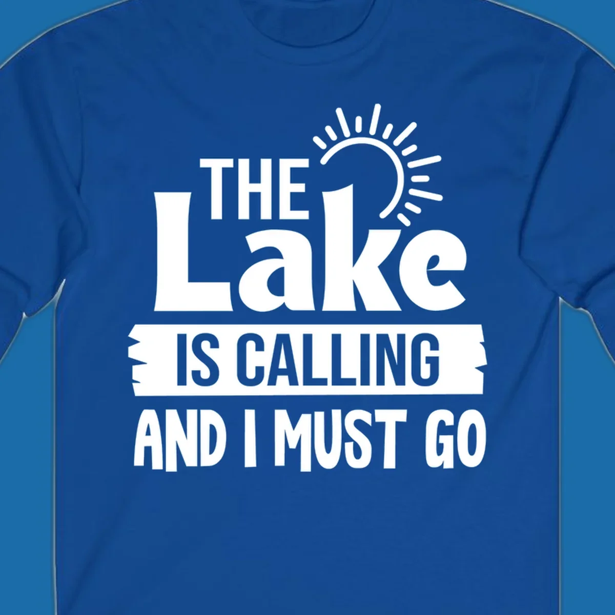 The Lake Is Calling And I Must Go text with a sun graphic. lake-calling-go