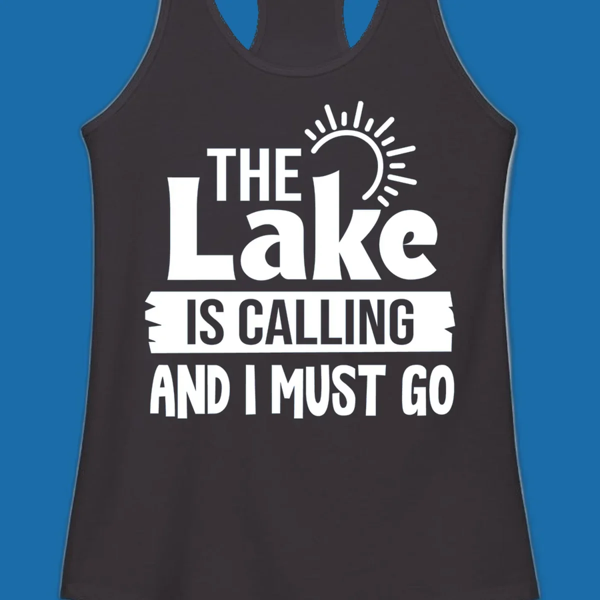 The Lake Is Calling And I Must Go text with a sun graphic. lake-calling-go
