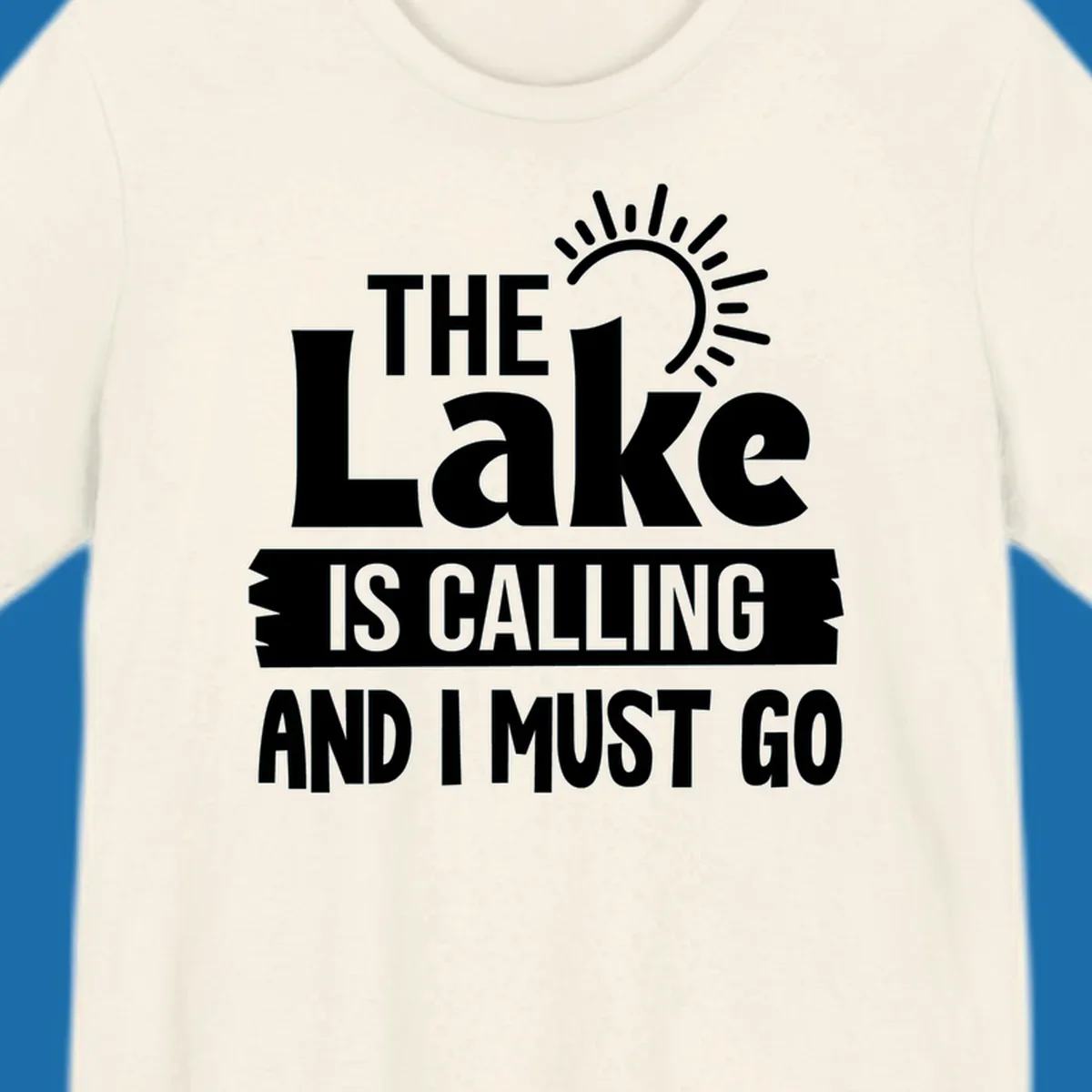 The Lake Is Calling And I Must Go text with a sun graphic. lake-calling-go