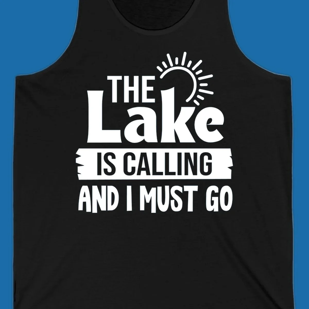 The Lake Is Calling And I Must Go text with a sun graphic. lake-calling-go