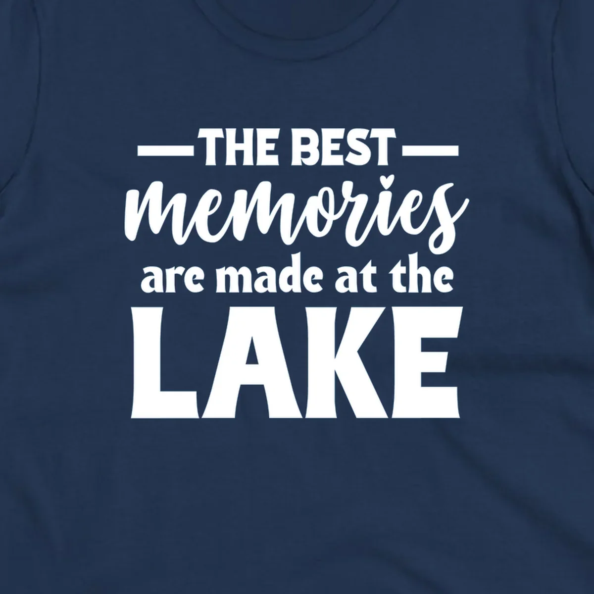 White typography design with the phrase 'THE BEST memories are made at the LAKE', featuring a heart accent.