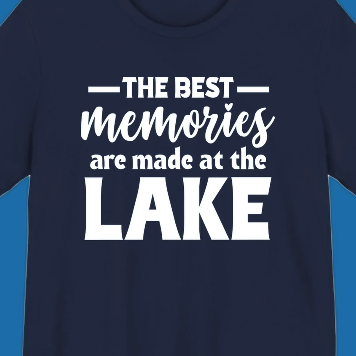 White typography design with the phrase 'THE BEST memories are made at the LAKE', featuring a heart accent.