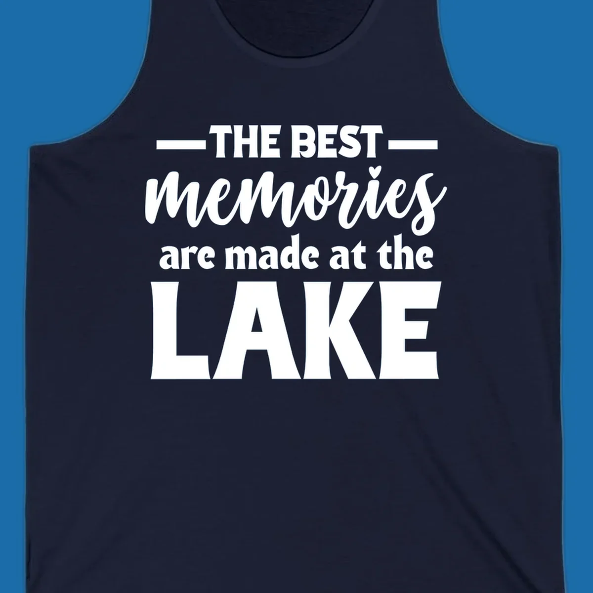 White typography design with the phrase 'THE BEST memories are made at the LAKE', featuring a heart accent.