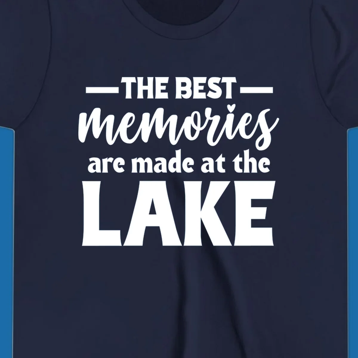 White typography design with the phrase 'THE BEST memories are made at the LAKE', featuring a heart accent.