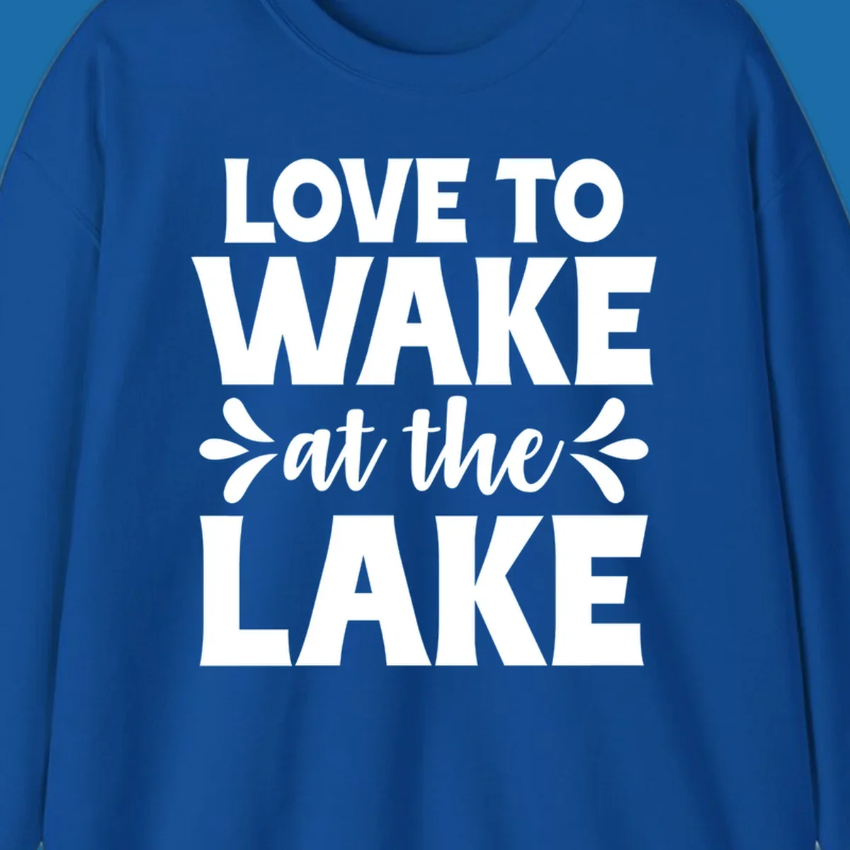 Typography design for 'Love To Wake At The Lake' featuring bold white lettering.