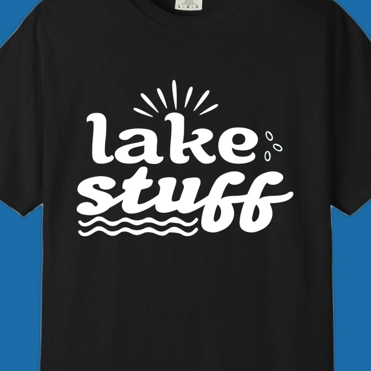 Lake Stuff fun lake vibes graphic with text, sun rays, water drops, and waves.