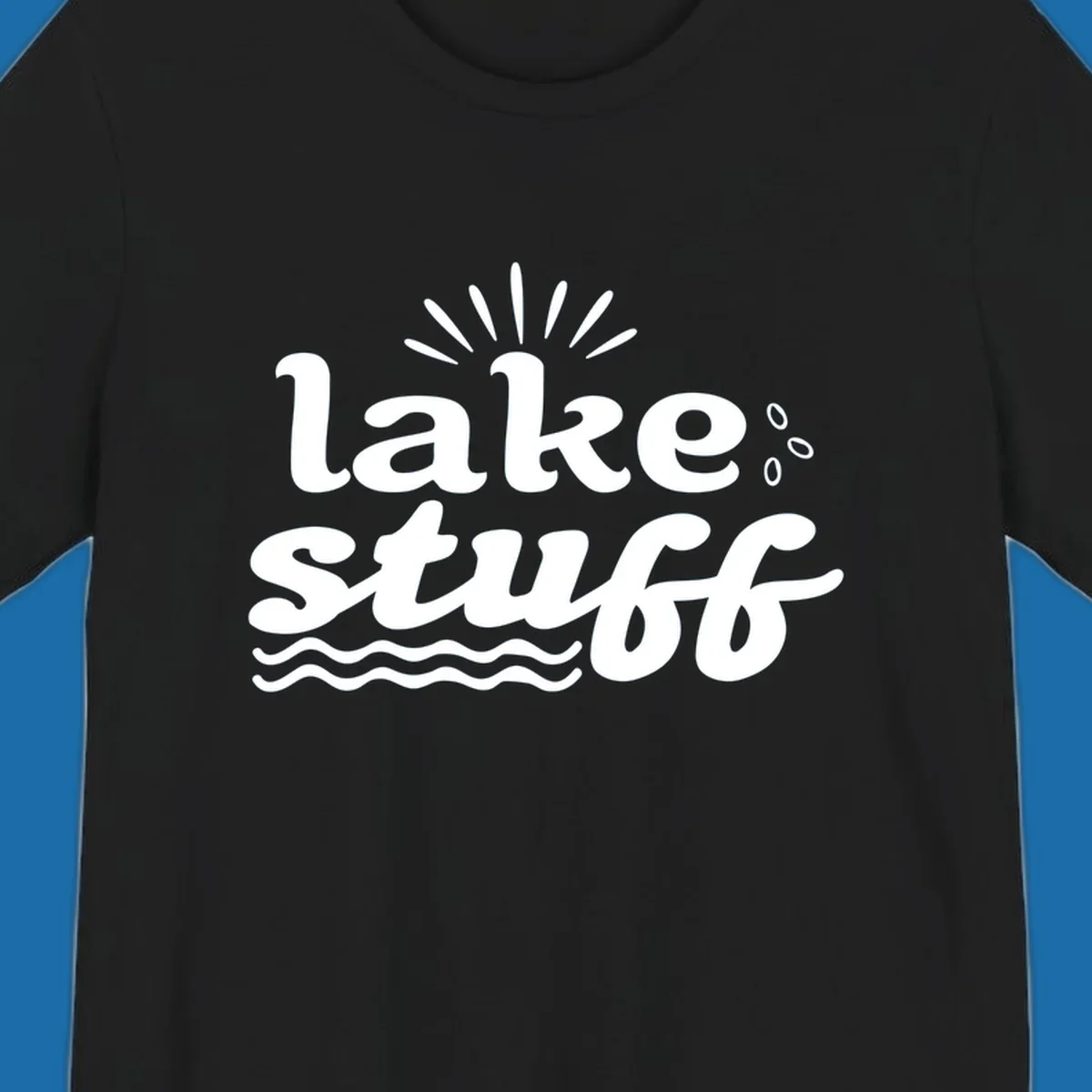 Lake Stuff fun lake vibes graphic with text, sun rays, water drops, and waves.