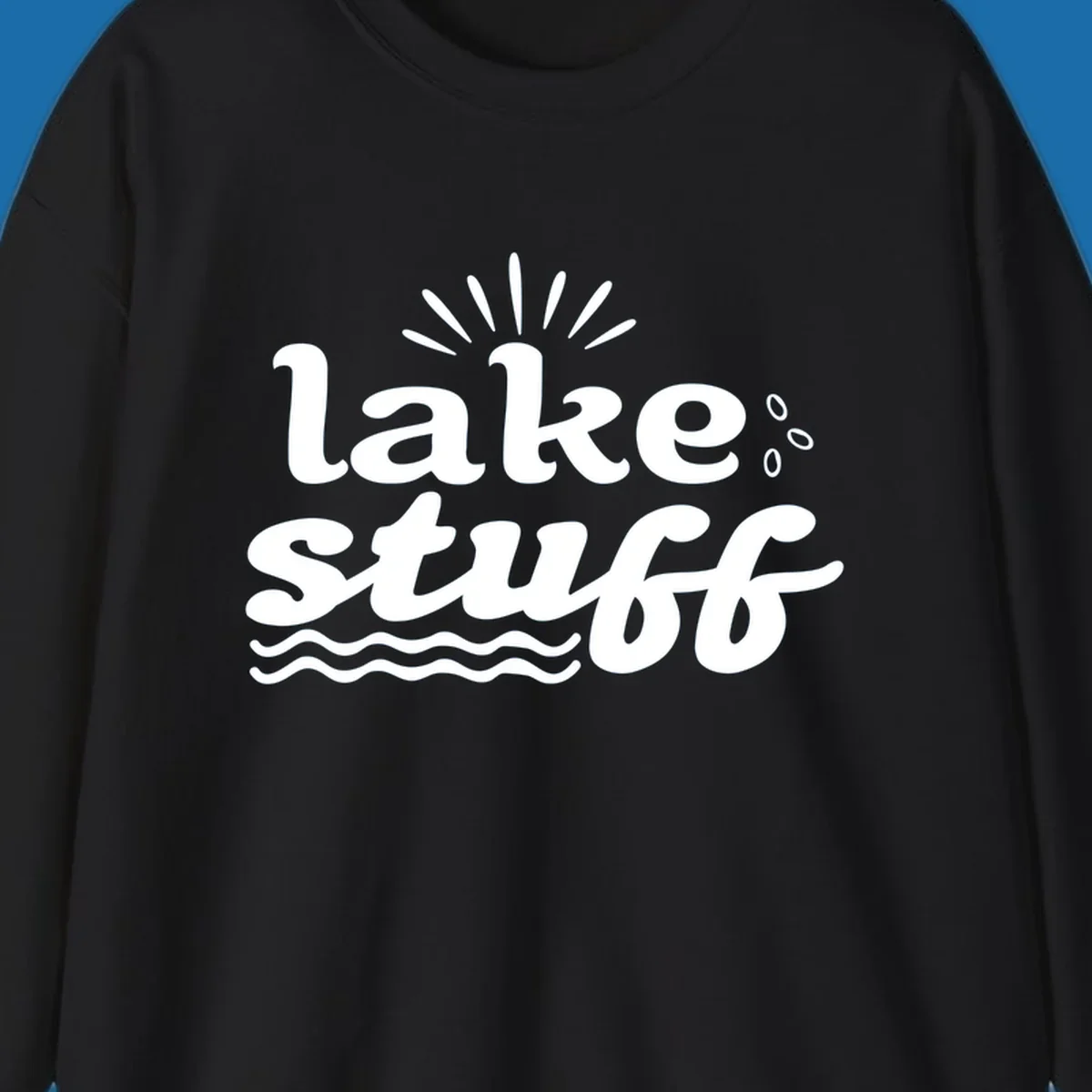 Lake Stuff fun lake vibes graphic with text, sun rays, water drops, and waves.