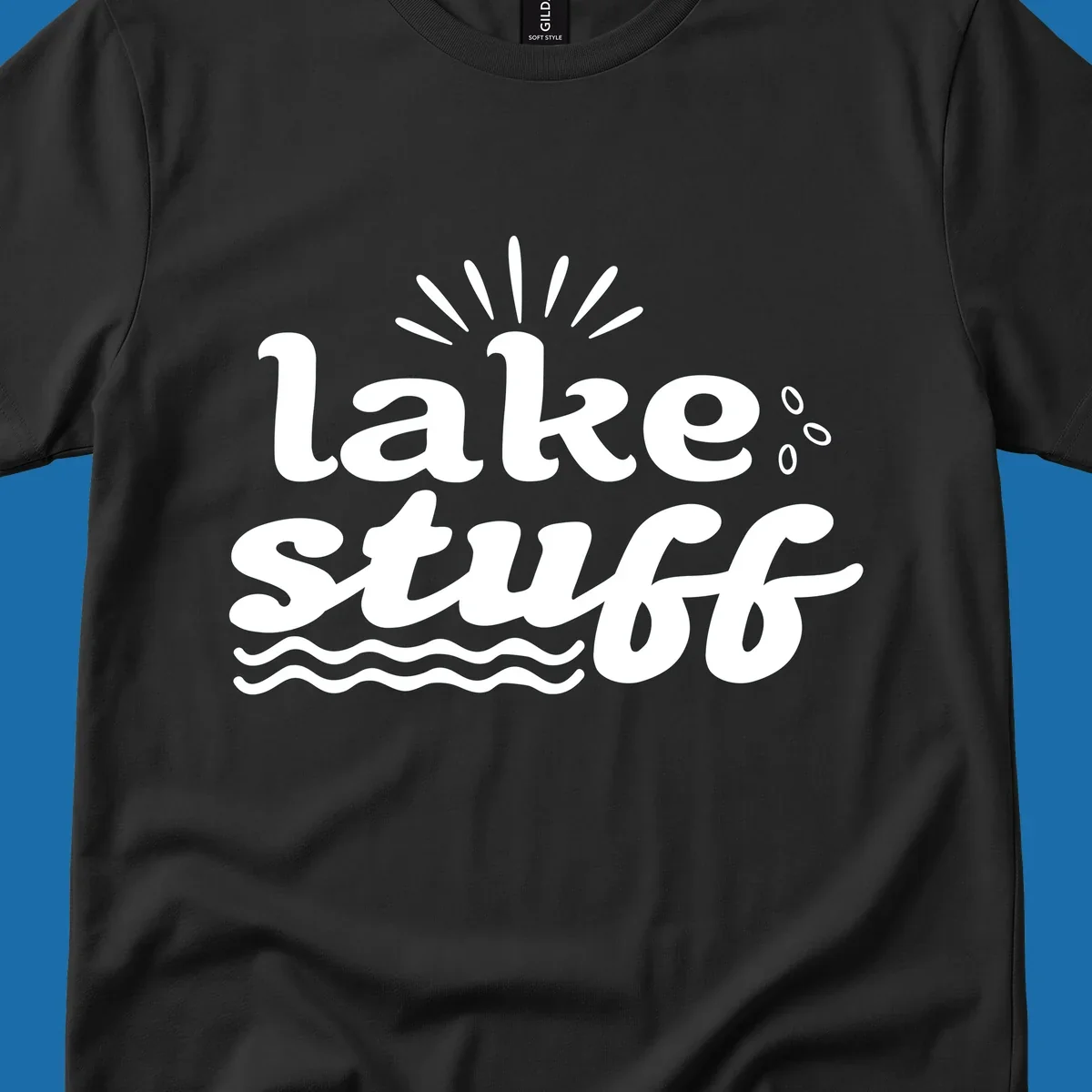 Lake Stuff fun lake vibes graphic with text, sun rays, water drops, and waves.