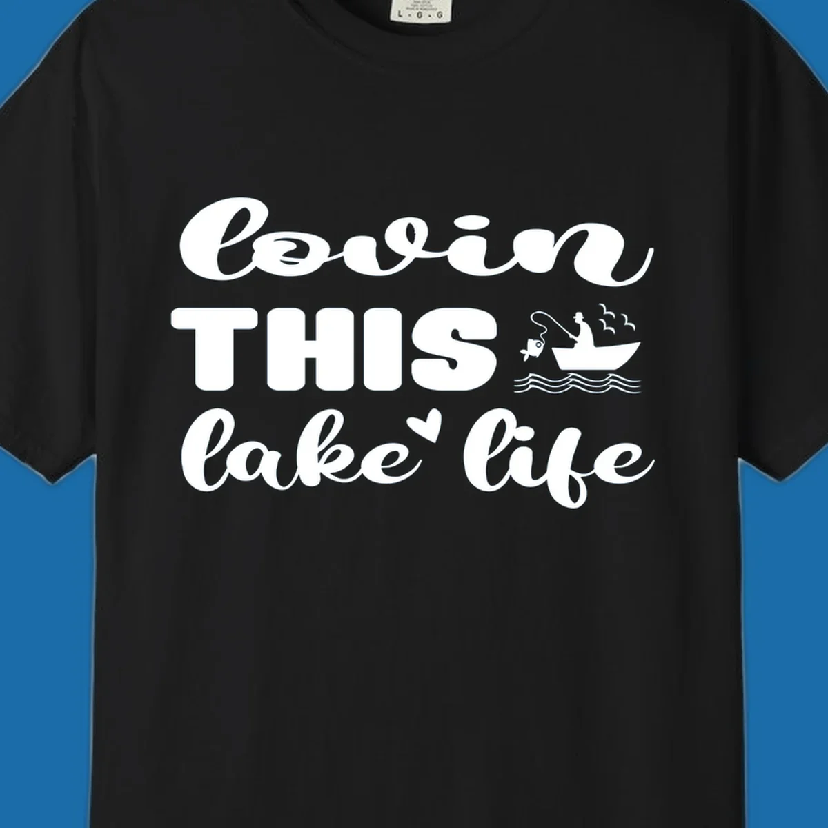 Lovin this lake life graphic with fisherman, fish, and birds.