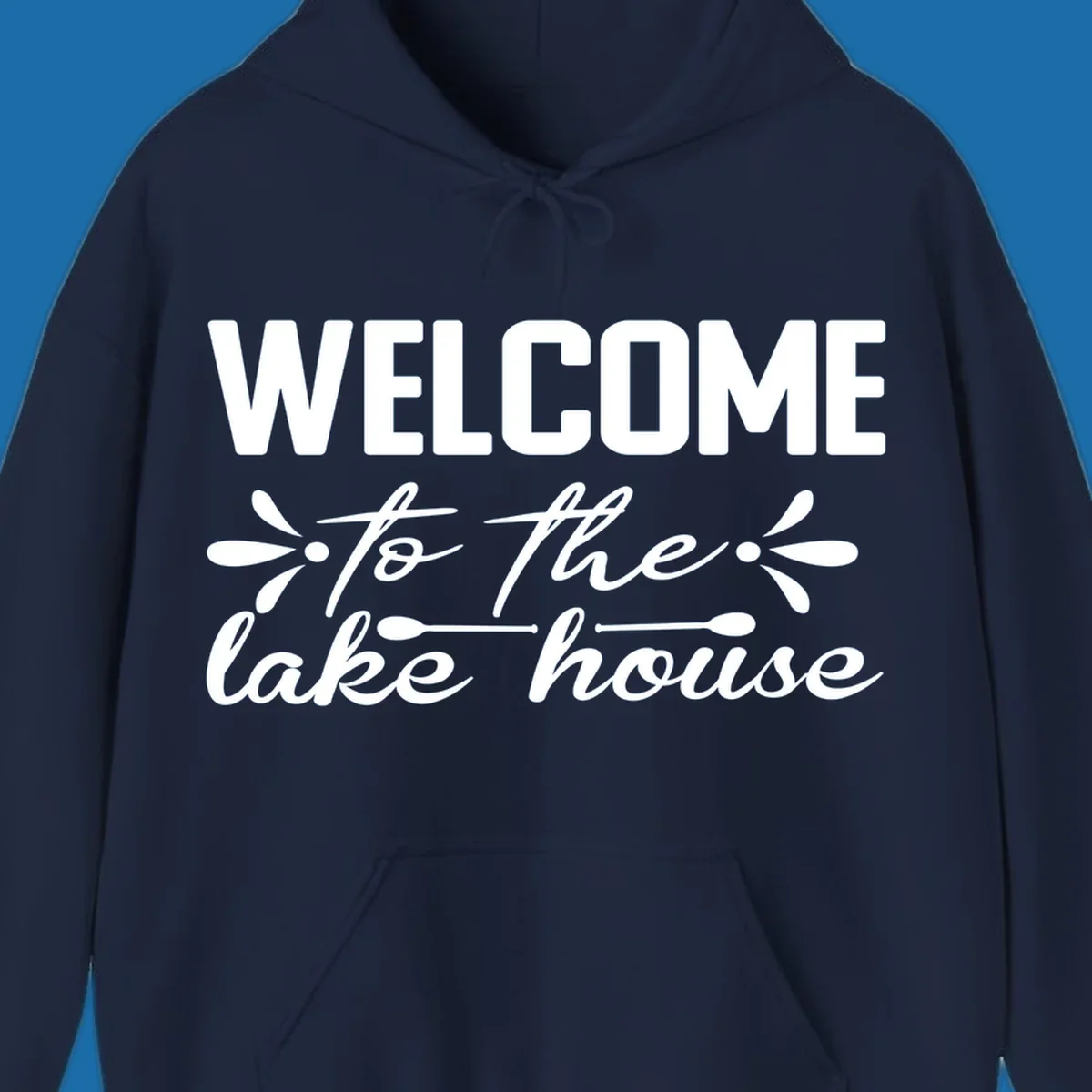 Welcome to the lake house text design with decorative elements.
