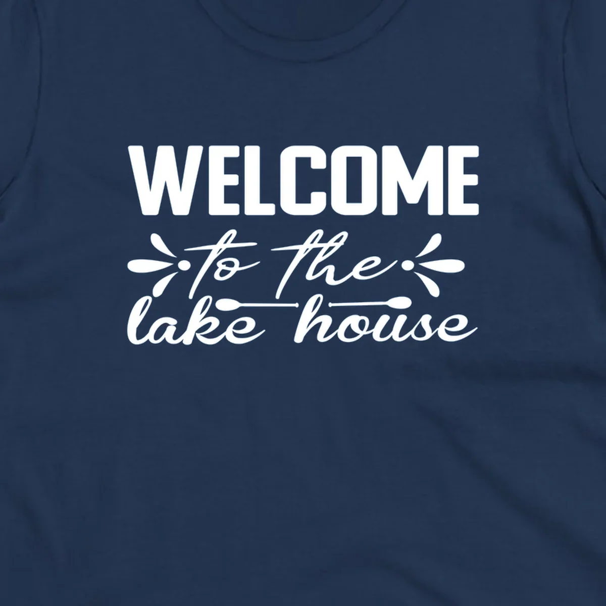 Welcome to the lake house text design with decorative elements.