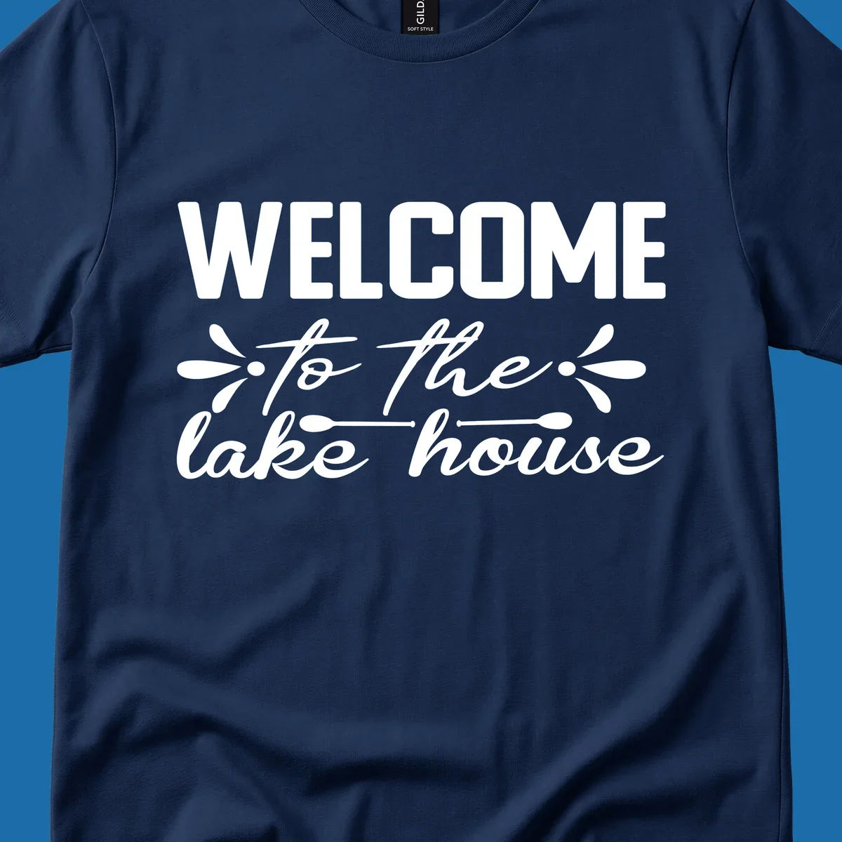 Welcome to the lake house text design with decorative elements.