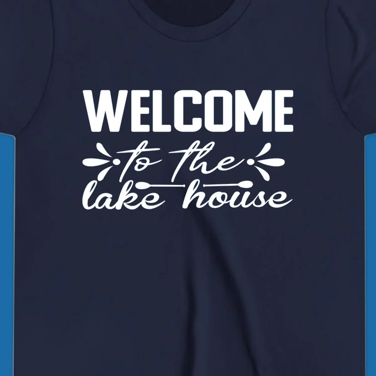 Welcome to the lake house text design with decorative elements.