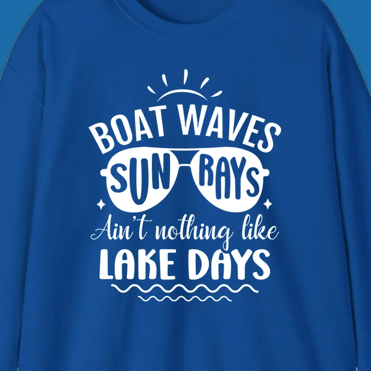 Boat waves sun rays ain't nothing like lake days text and graphic design