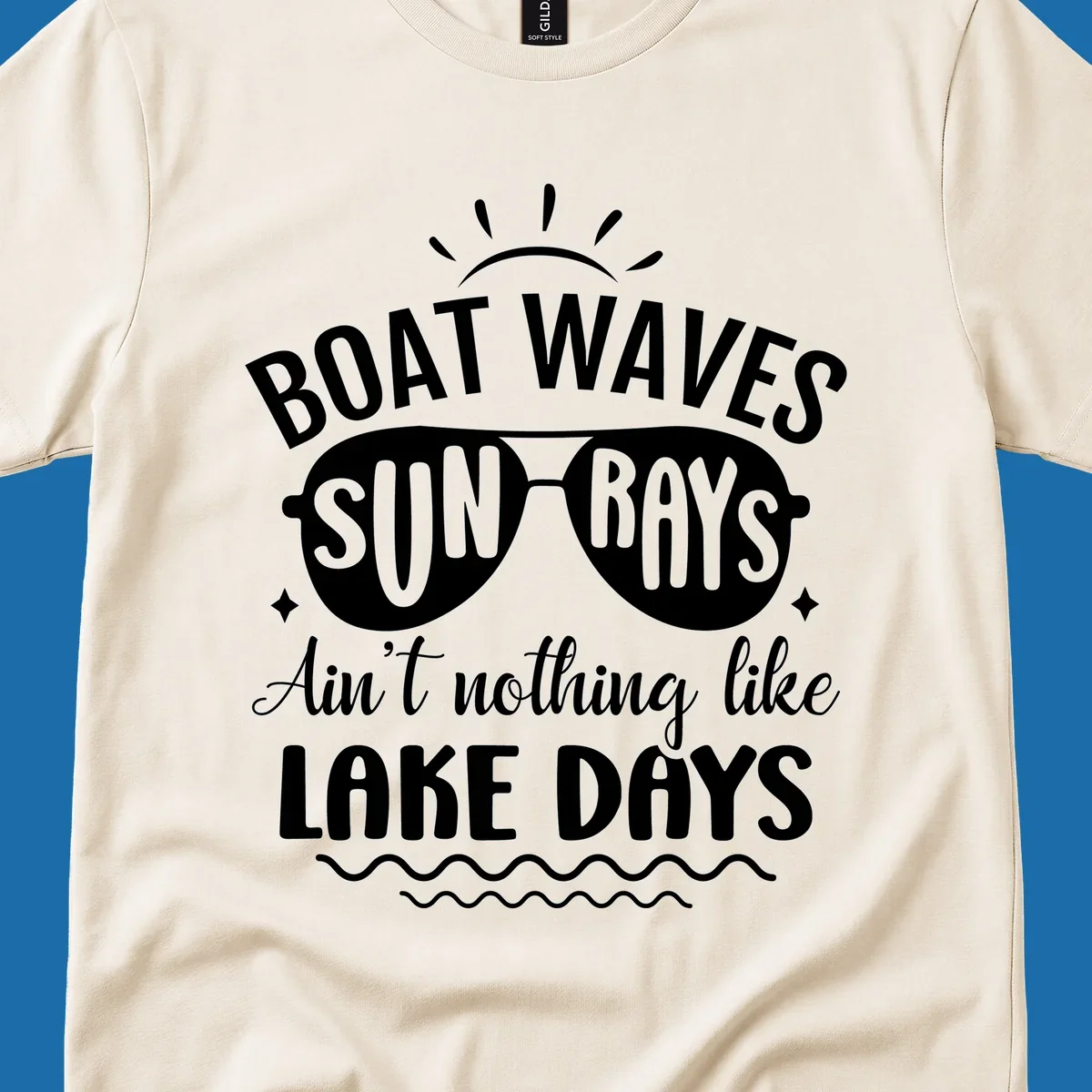 Boat waves sun rays ain't nothing like lake days text and graphic design