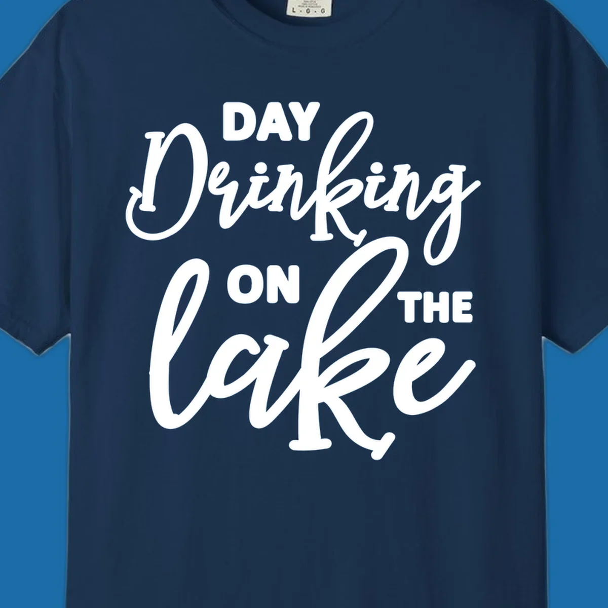 Typography design reading 'Day Drinking On The Lake' for lake day apparel.