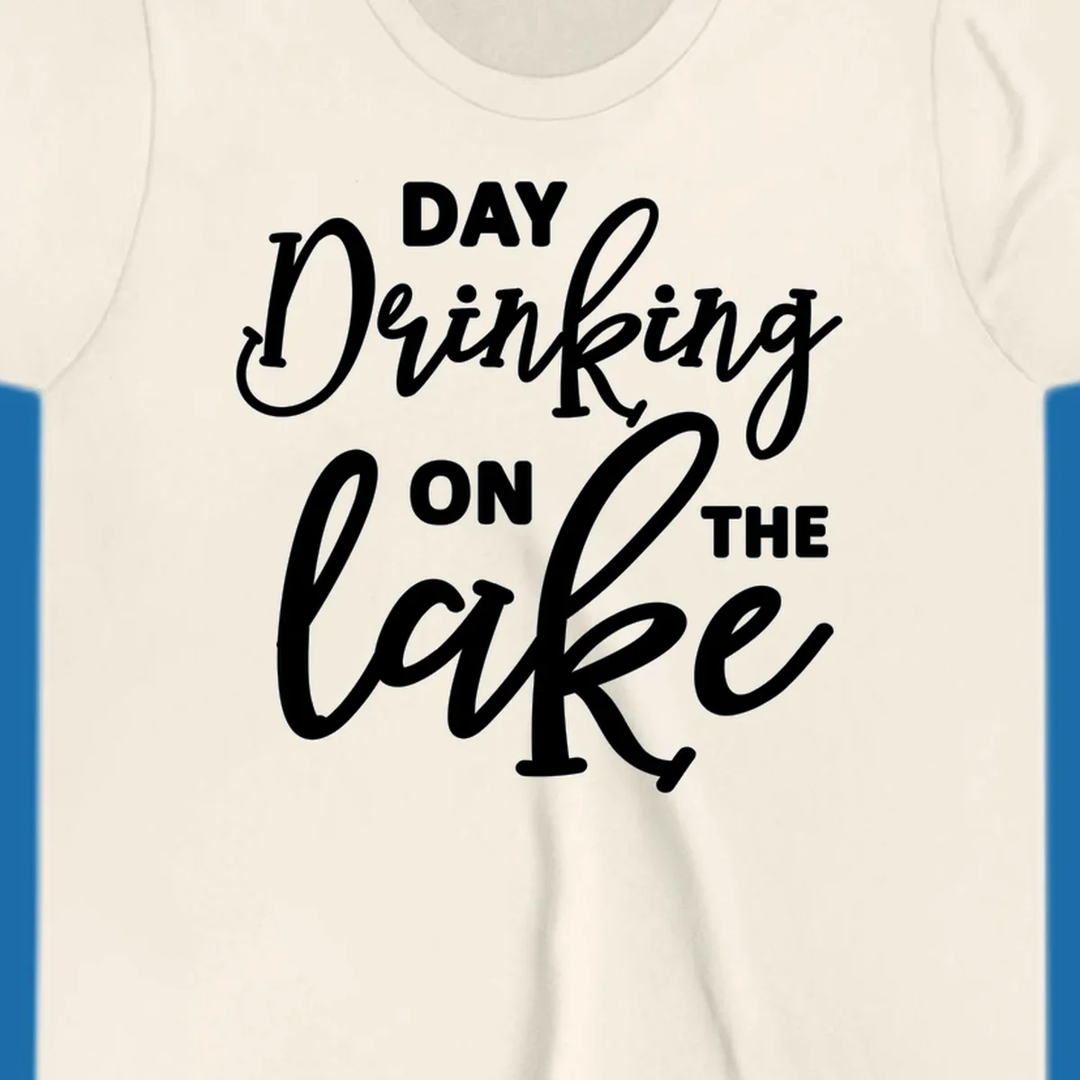 Typography design reading 'Day Drinking On The Lake' for lake day apparel.