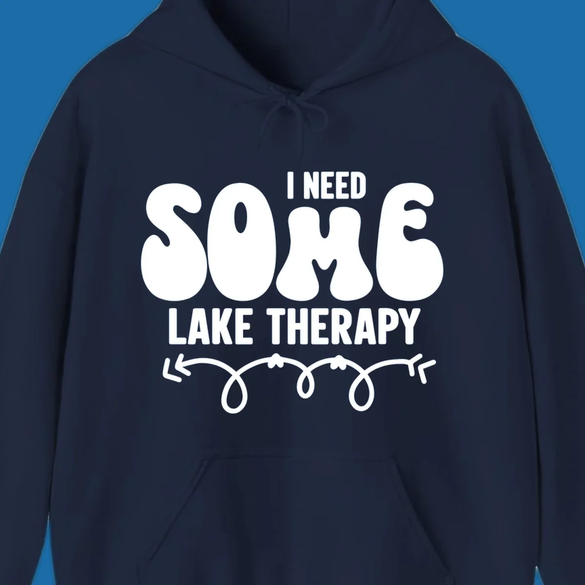 White "I Need Some Lake Therapy" text design with decorative wavy arrow line.