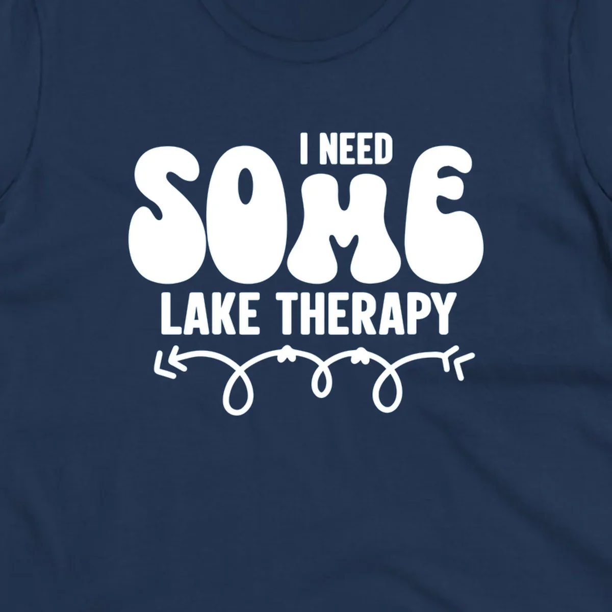 White "I Need Some Lake Therapy" text design with decorative wavy arrow line.