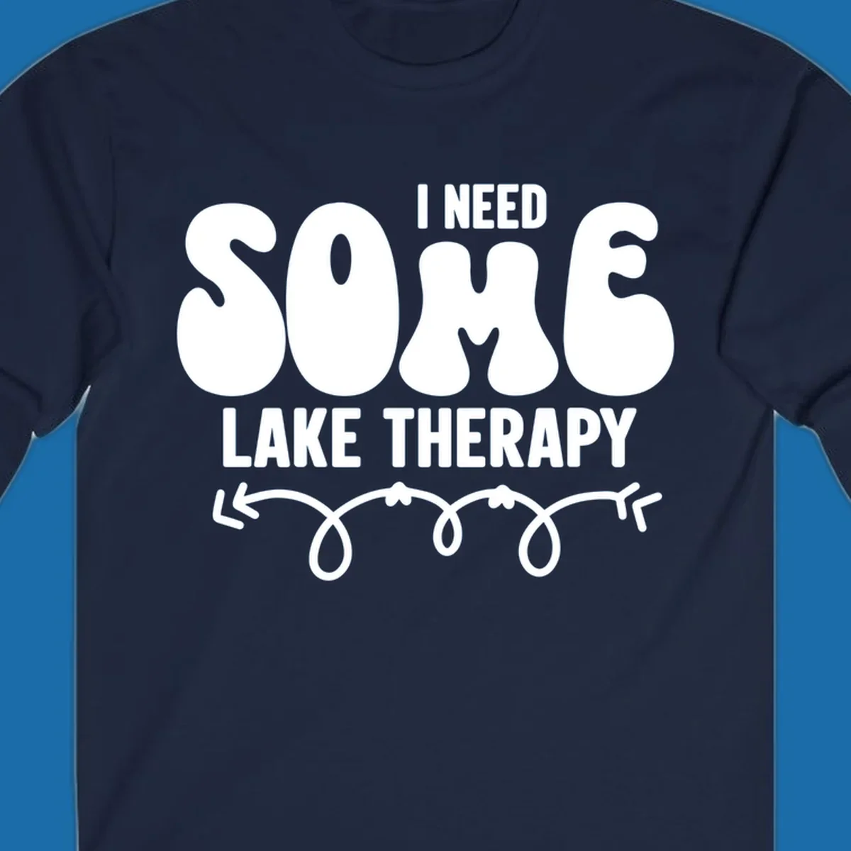 White "I Need Some Lake Therapy" text design with decorative wavy arrow line.