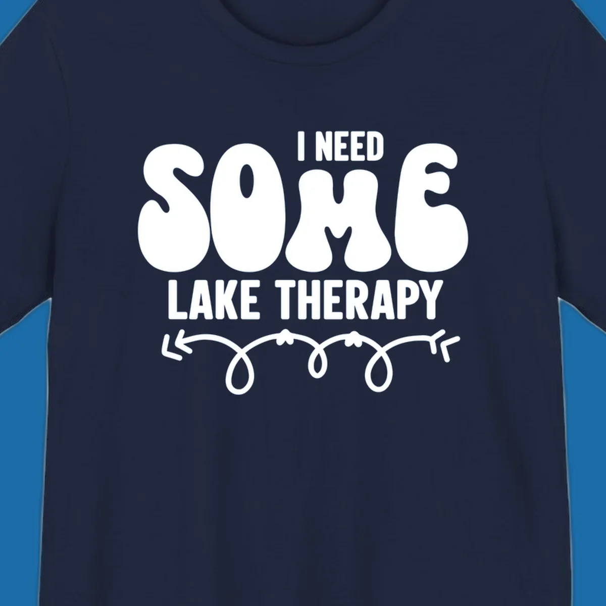 White "I Need Some Lake Therapy" text design with decorative wavy arrow line.