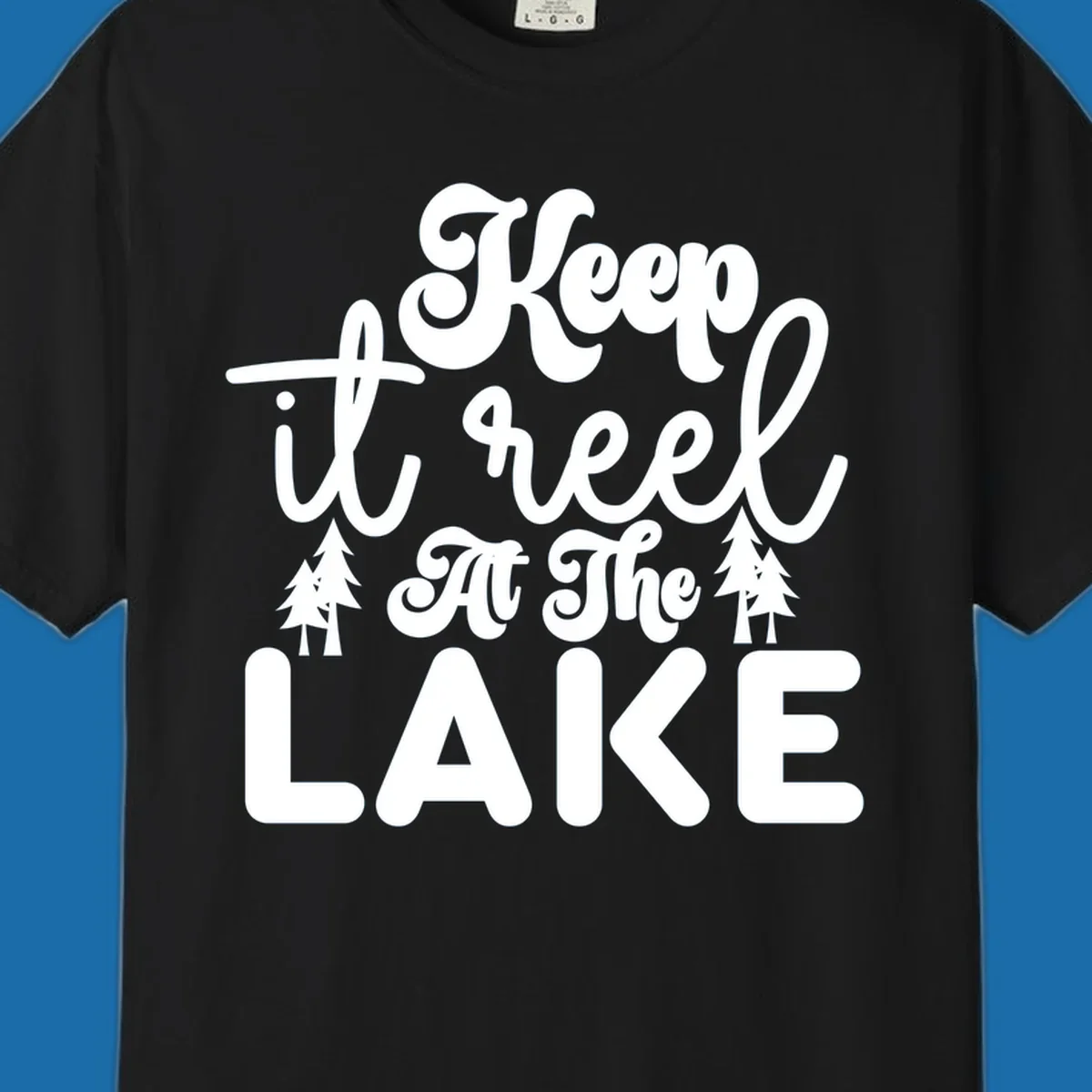 Keep it reel at the lake typography design with pine trees.