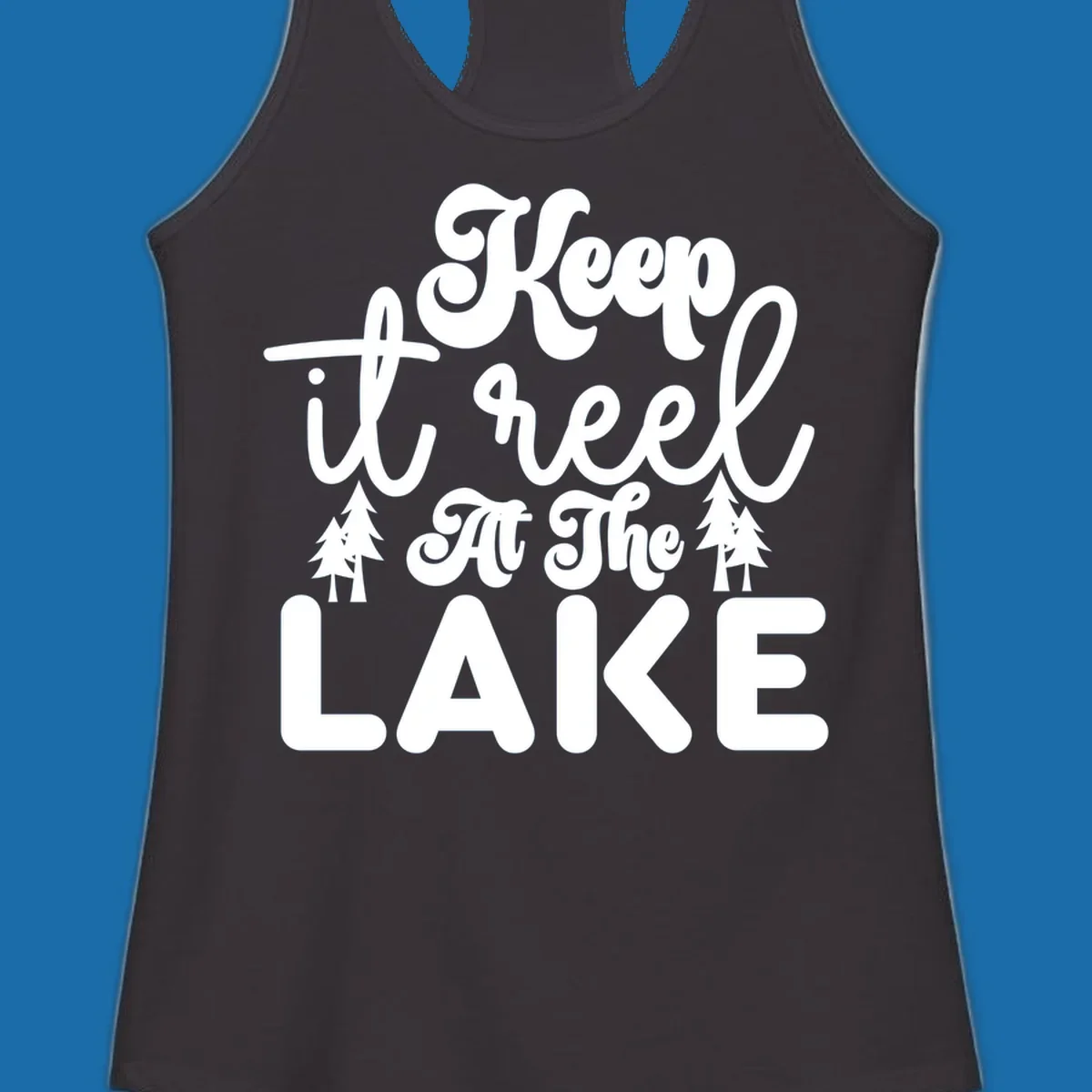 Keep it reel at the lake typography design with pine trees.