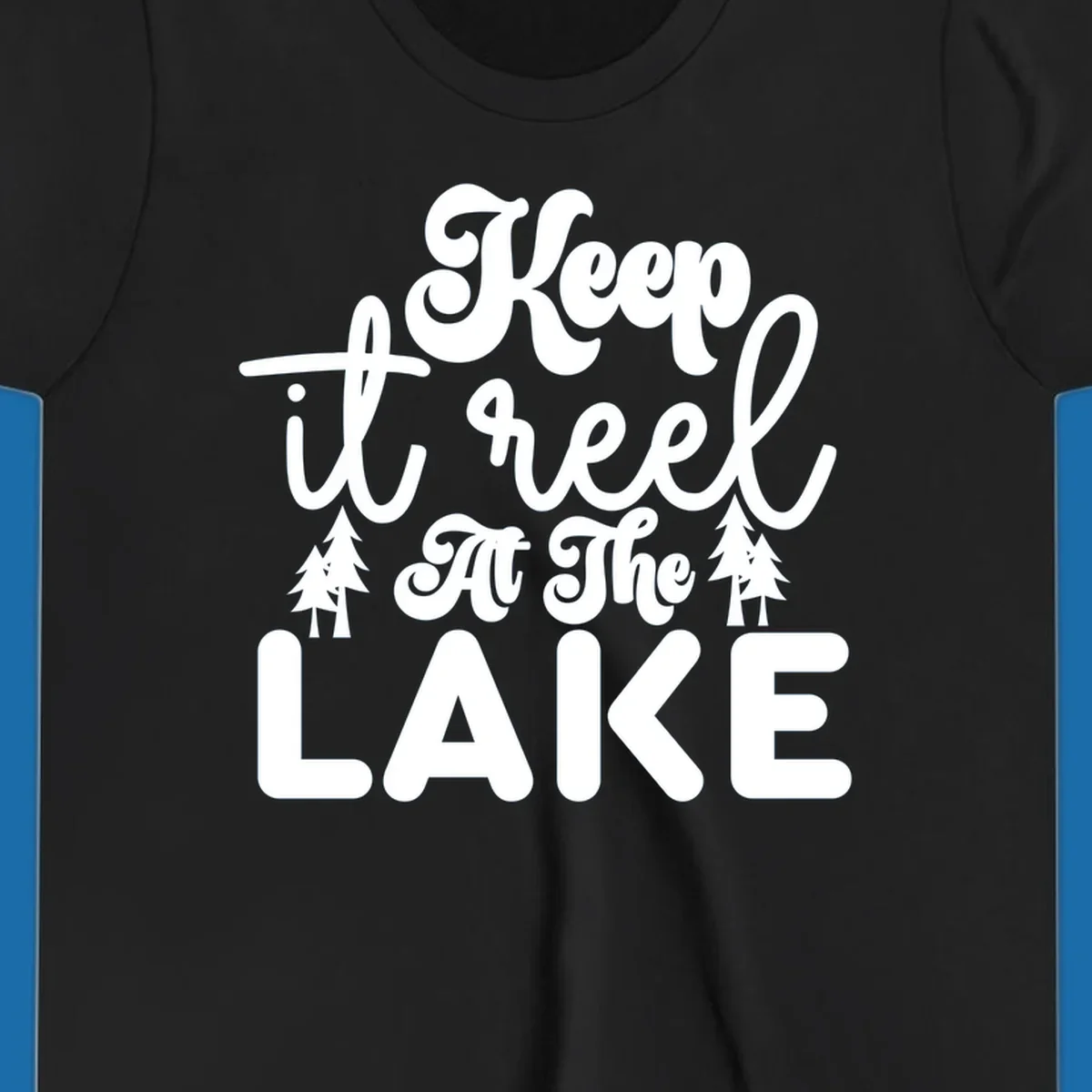 Keep it reel at the lake typography design with pine trees.