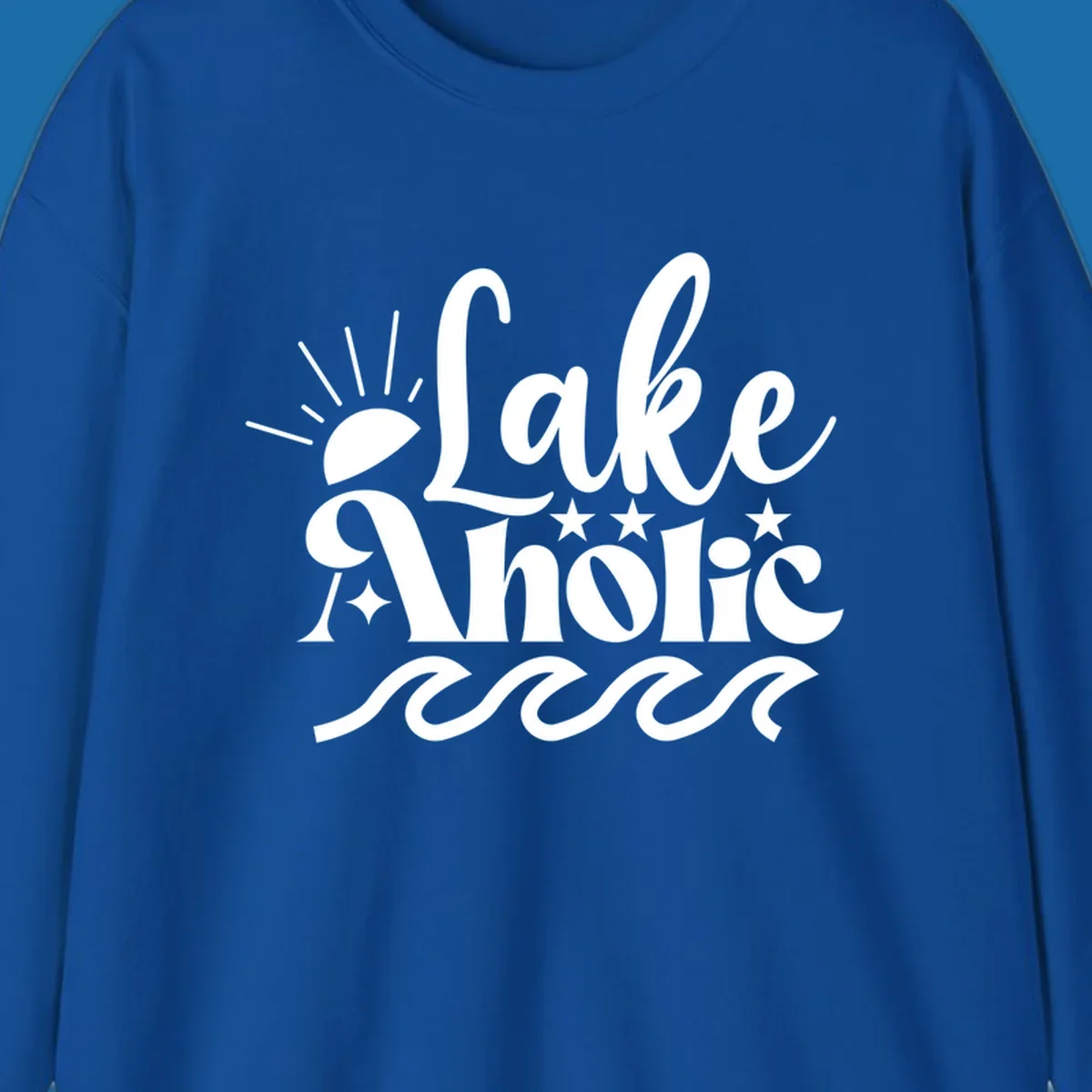 Lake aholic retro script design with sun, stars, and waves.