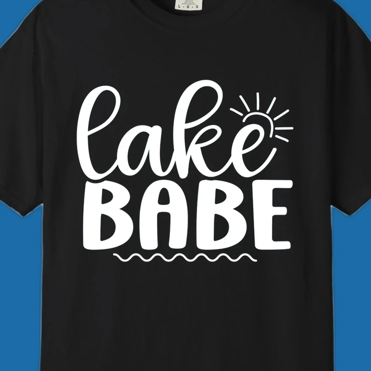 Lake Babe text design with sun rays and wavy lines.