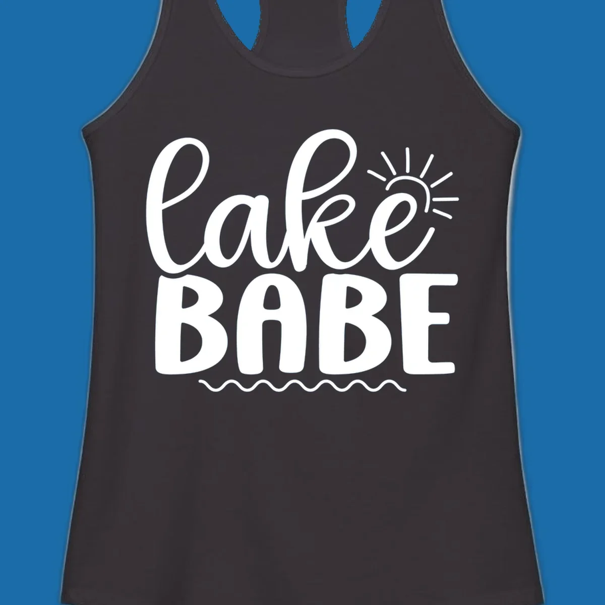 Lake Babe text design with sun rays and wavy lines.