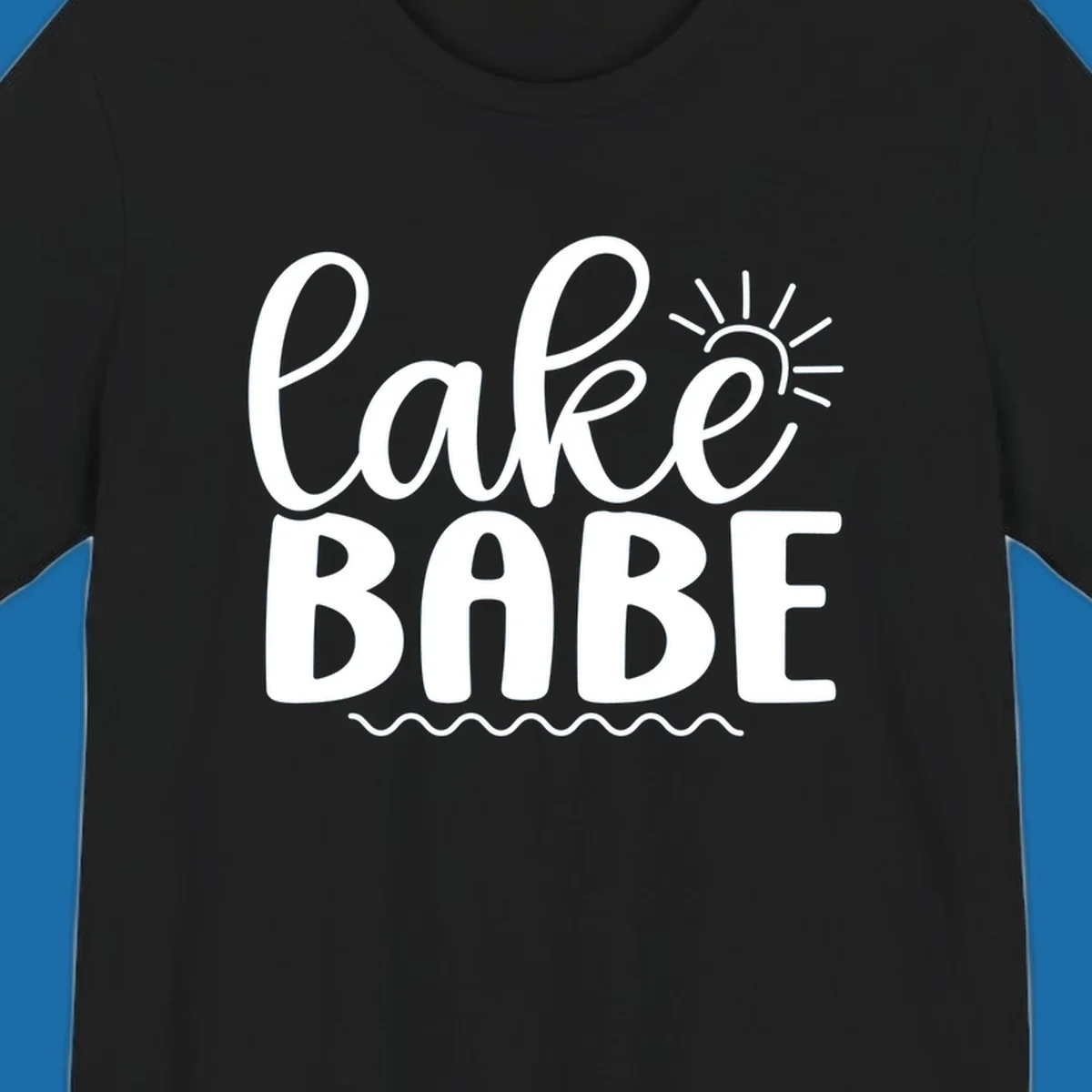Lake Babe text design with sun rays and wavy lines.