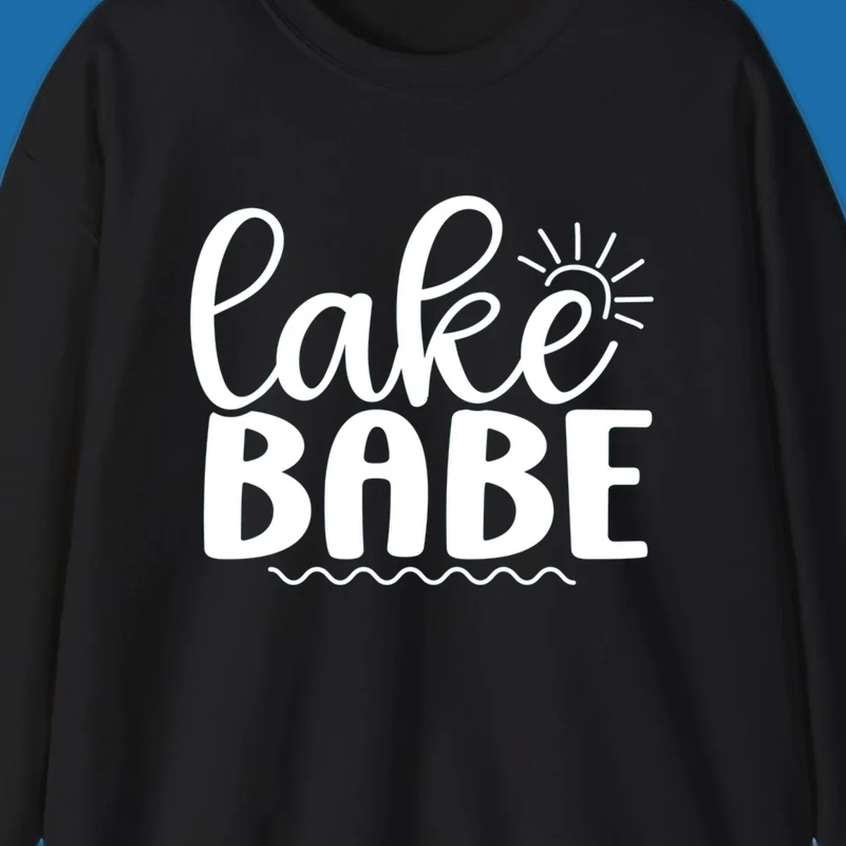 Lake Babe text design with sun rays and wavy lines.