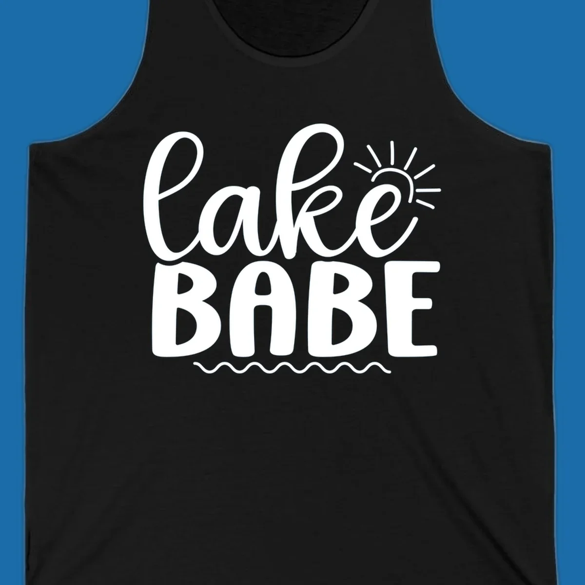 Lake Babe text design with sun rays and wavy lines.