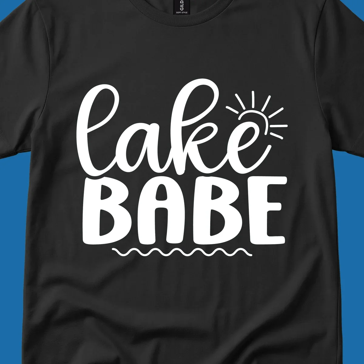 Lake Babe text design with sun rays and wavy lines.