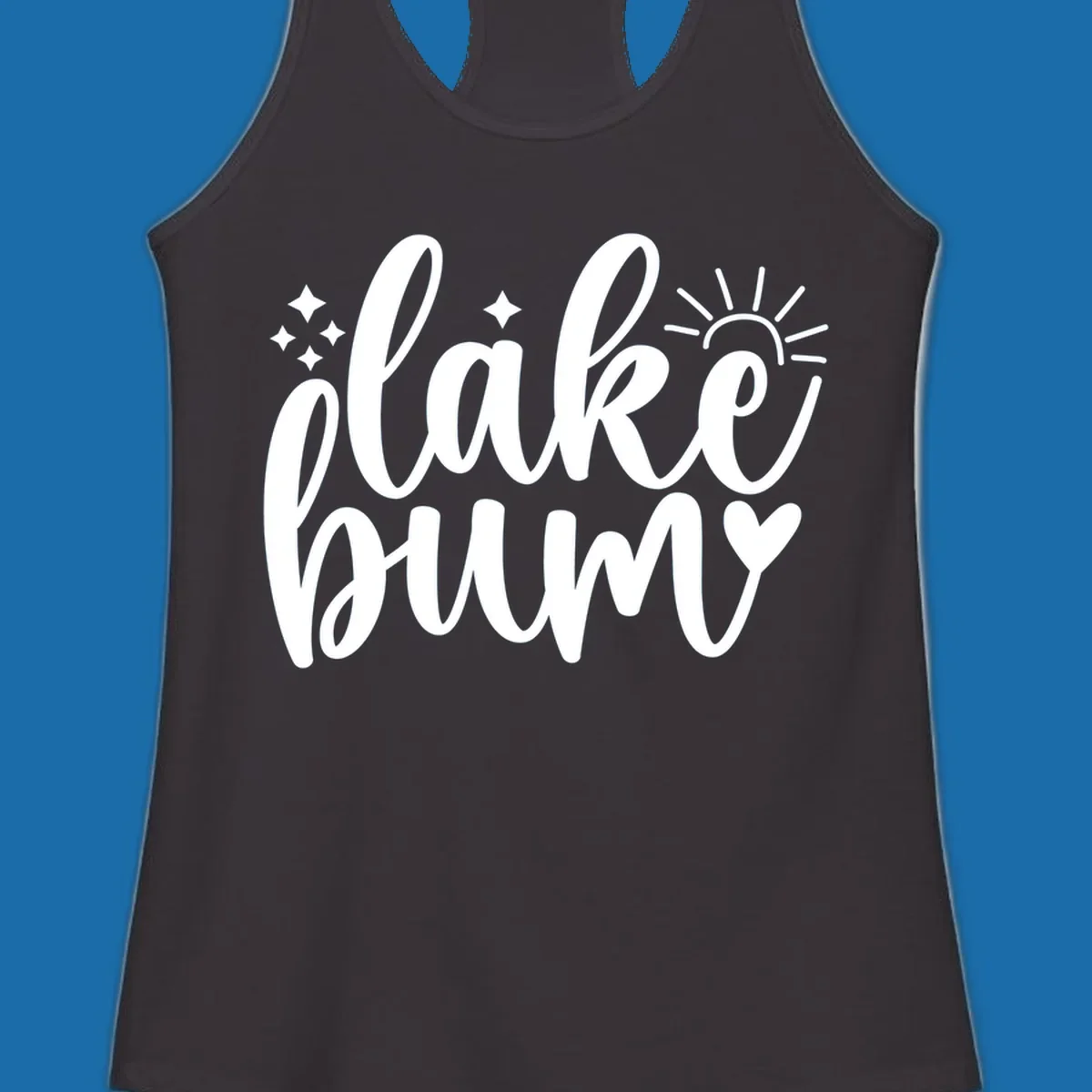 Lake bum text design with sun, sparkles, and heart graphic.