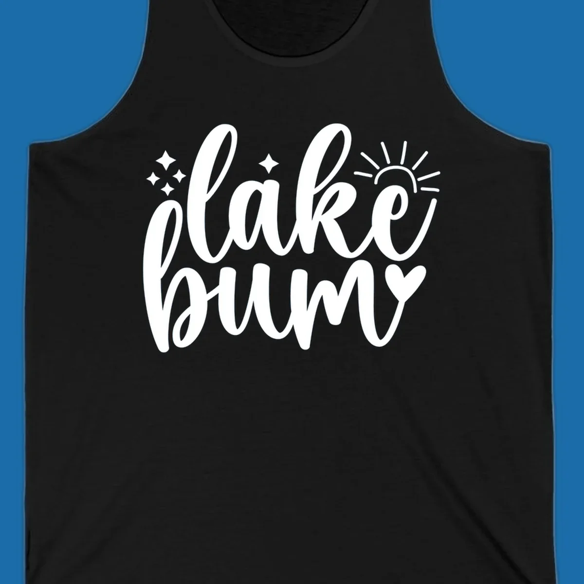 Lake bum text design with sun, sparkles, and heart graphic.