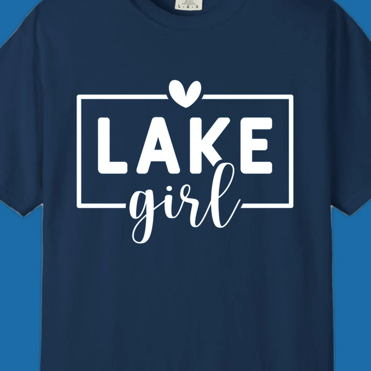 Lake girl text design with heart and border, in white on black background.