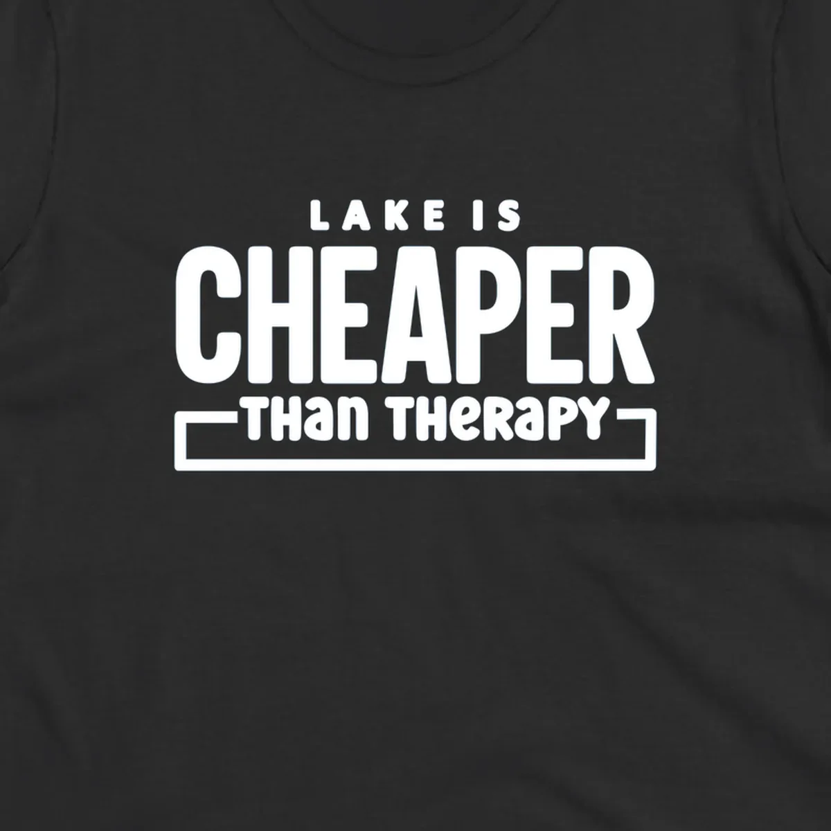 White text reads "LAKE IS CHEAPER THAN THERAPY", a humorous phrase about lake life.
