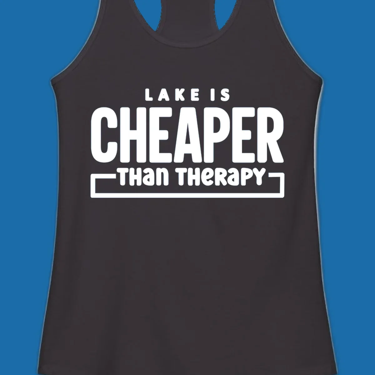 White text reads "LAKE IS CHEAPER THAN THERAPY", a humorous phrase about lake life.