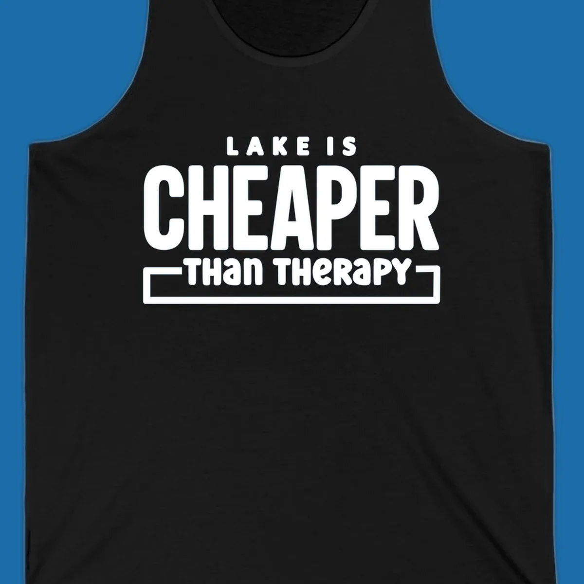 White text reads "LAKE IS CHEAPER THAN THERAPY", a humorous phrase about lake life.