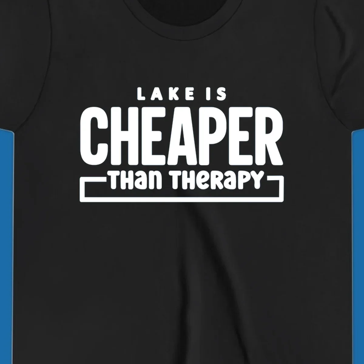 White text reads "LAKE IS CHEAPER THAN THERAPY", a humorous phrase about lake life.