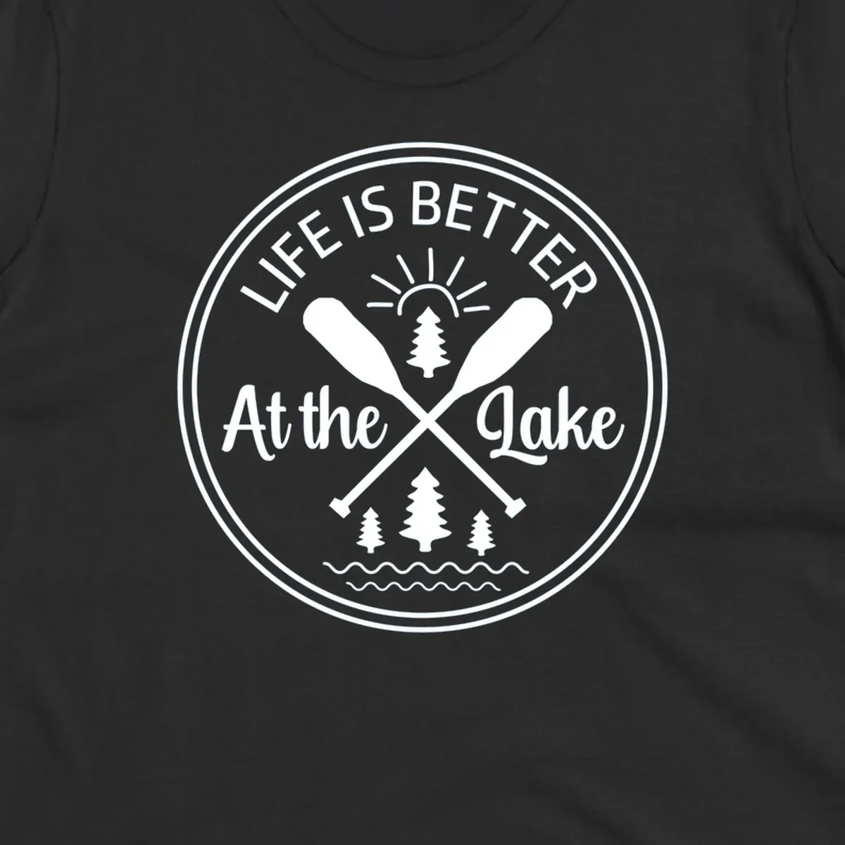 Life is better at the lake circular badge with oars, trees, sun, and waves.