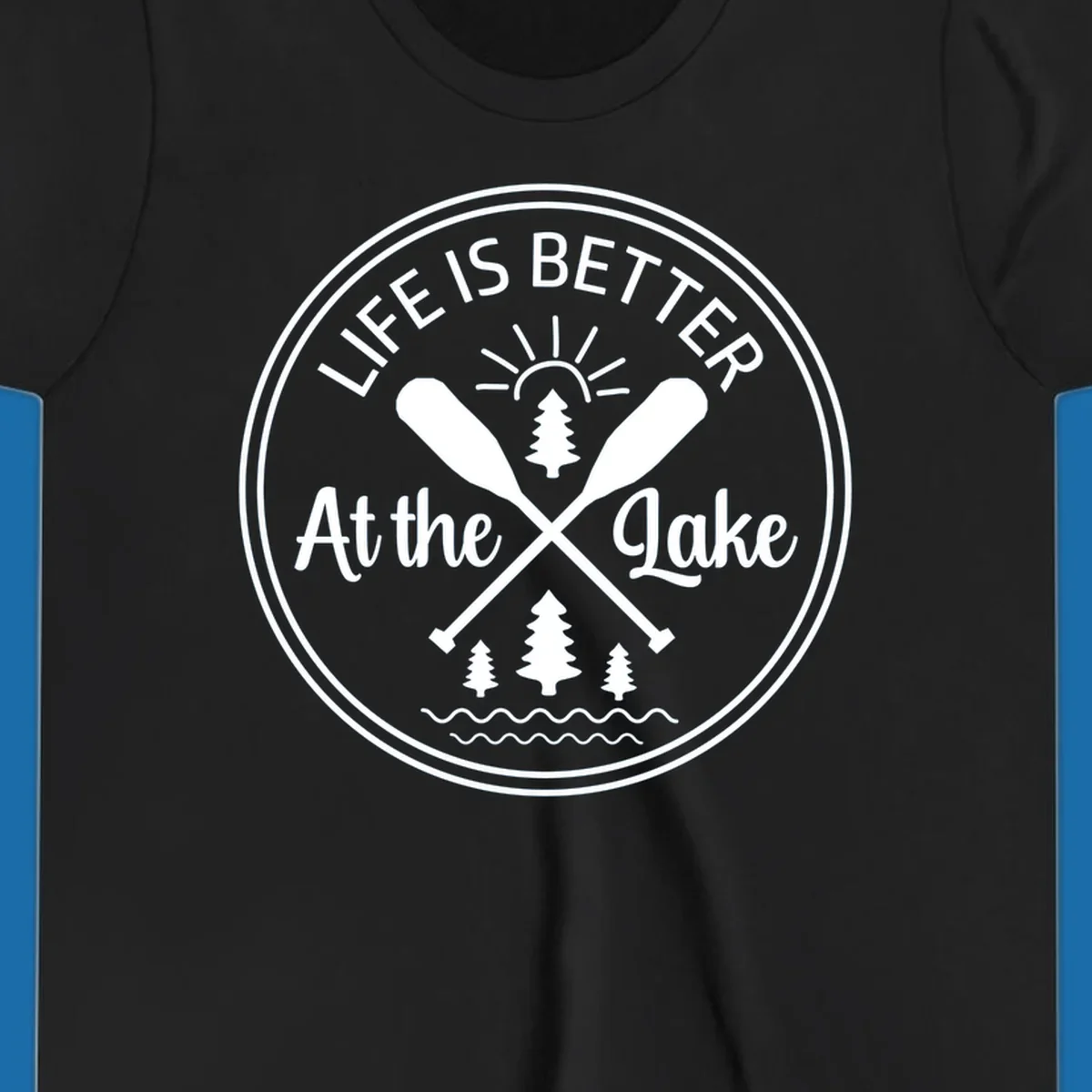 Life is better at the lake circular badge with oars, trees, sun, and waves.