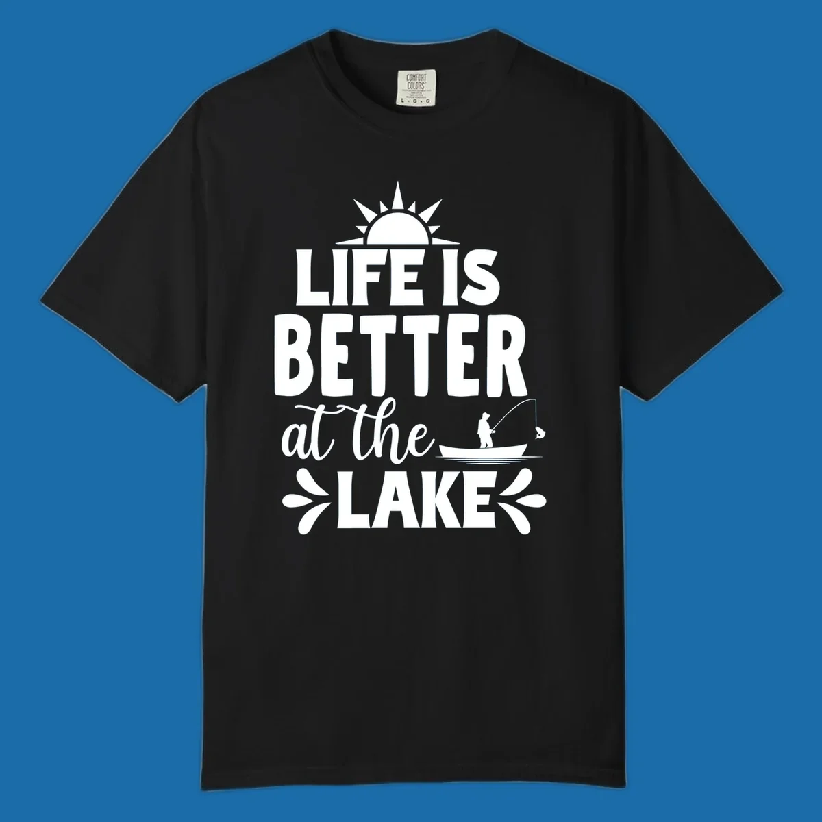 Life is better at the lake design with sun, fisherman, and fish.