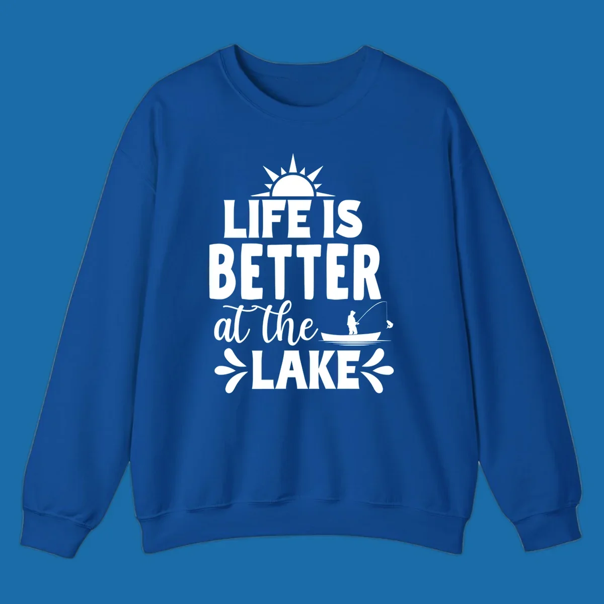 Life is better at the lake design with sun, fisherman, and fish.