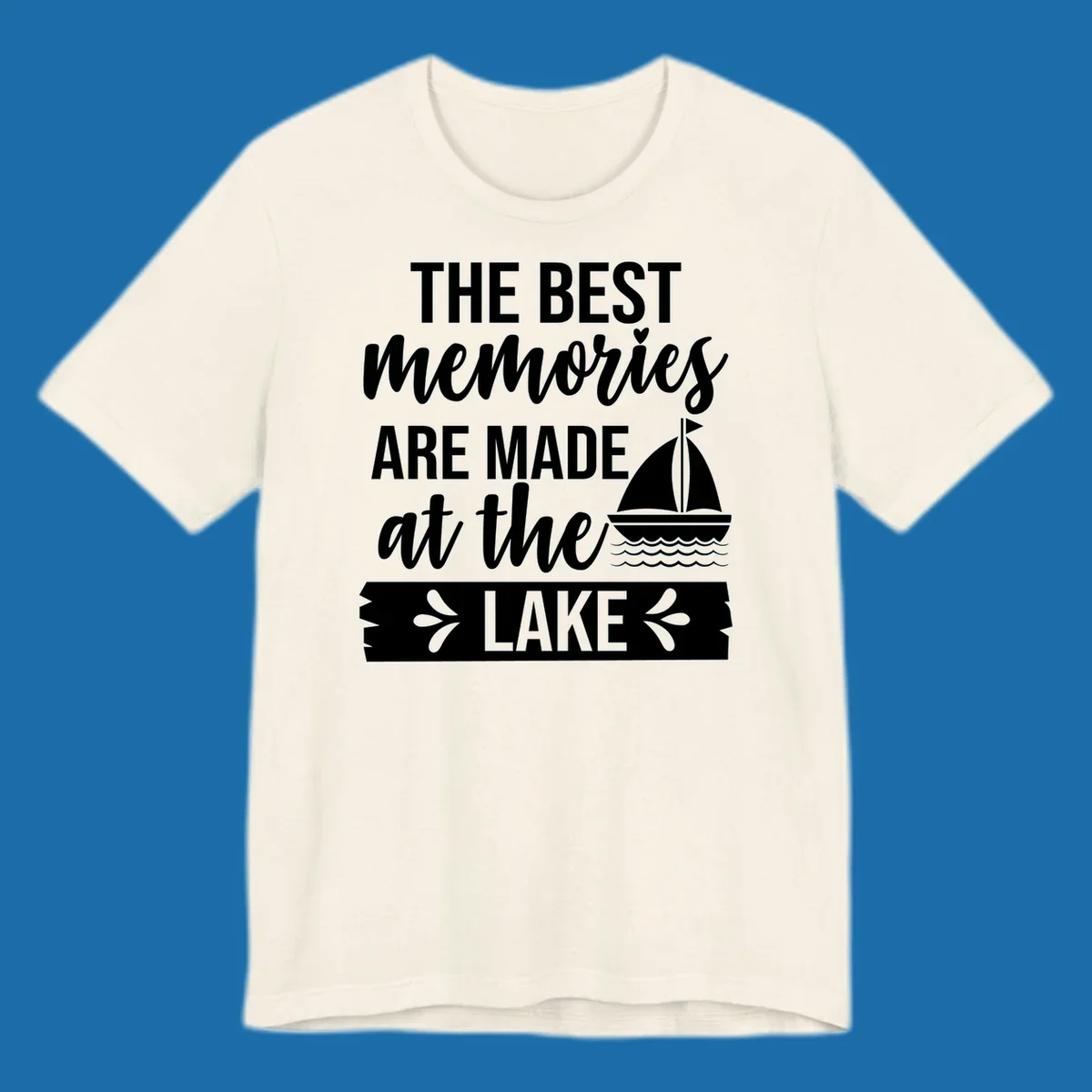 The Best Memories Are Made At The Lake text with sailboat graphic
